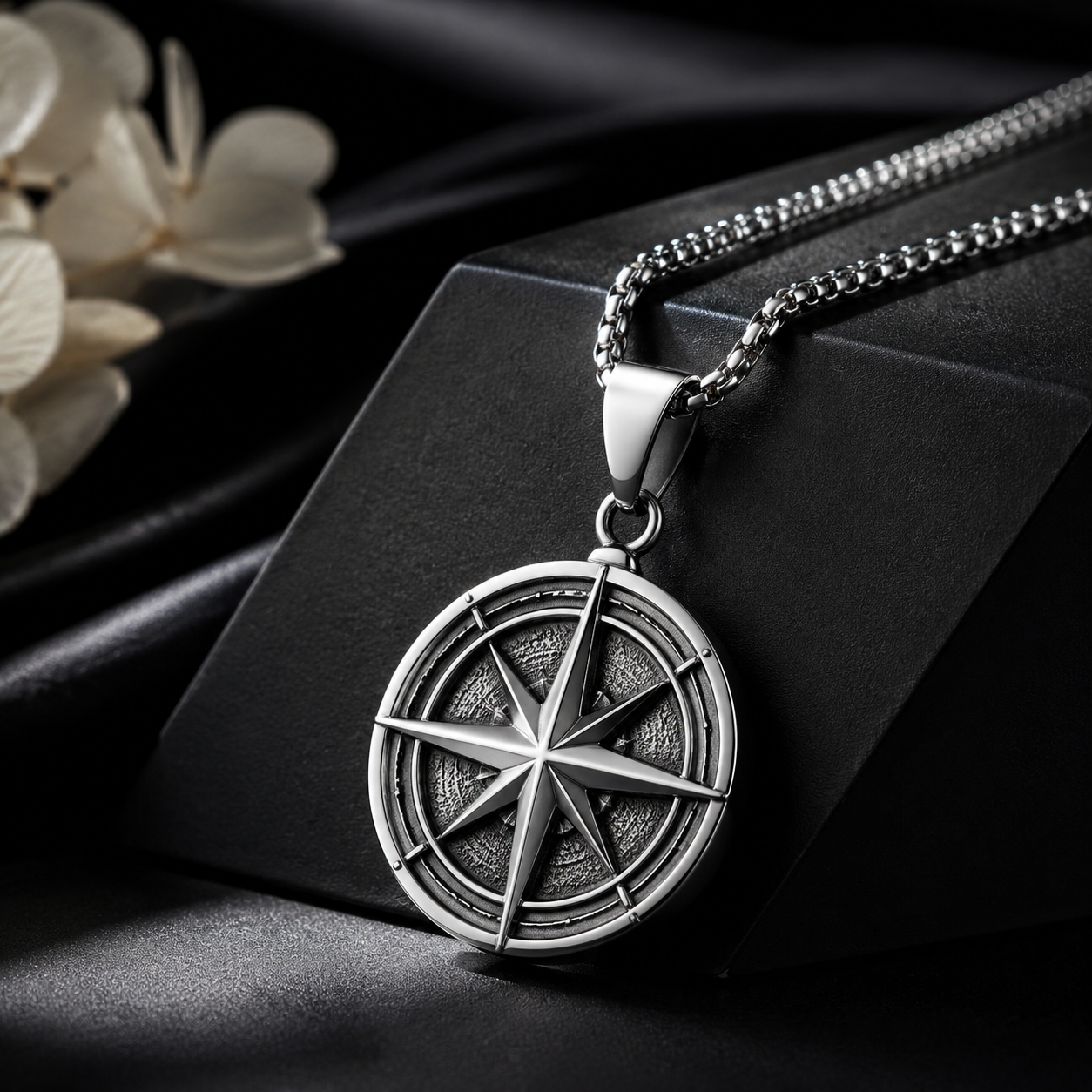 Premium single 316L stainless steel charm on pure white background with visible bail and polished finish