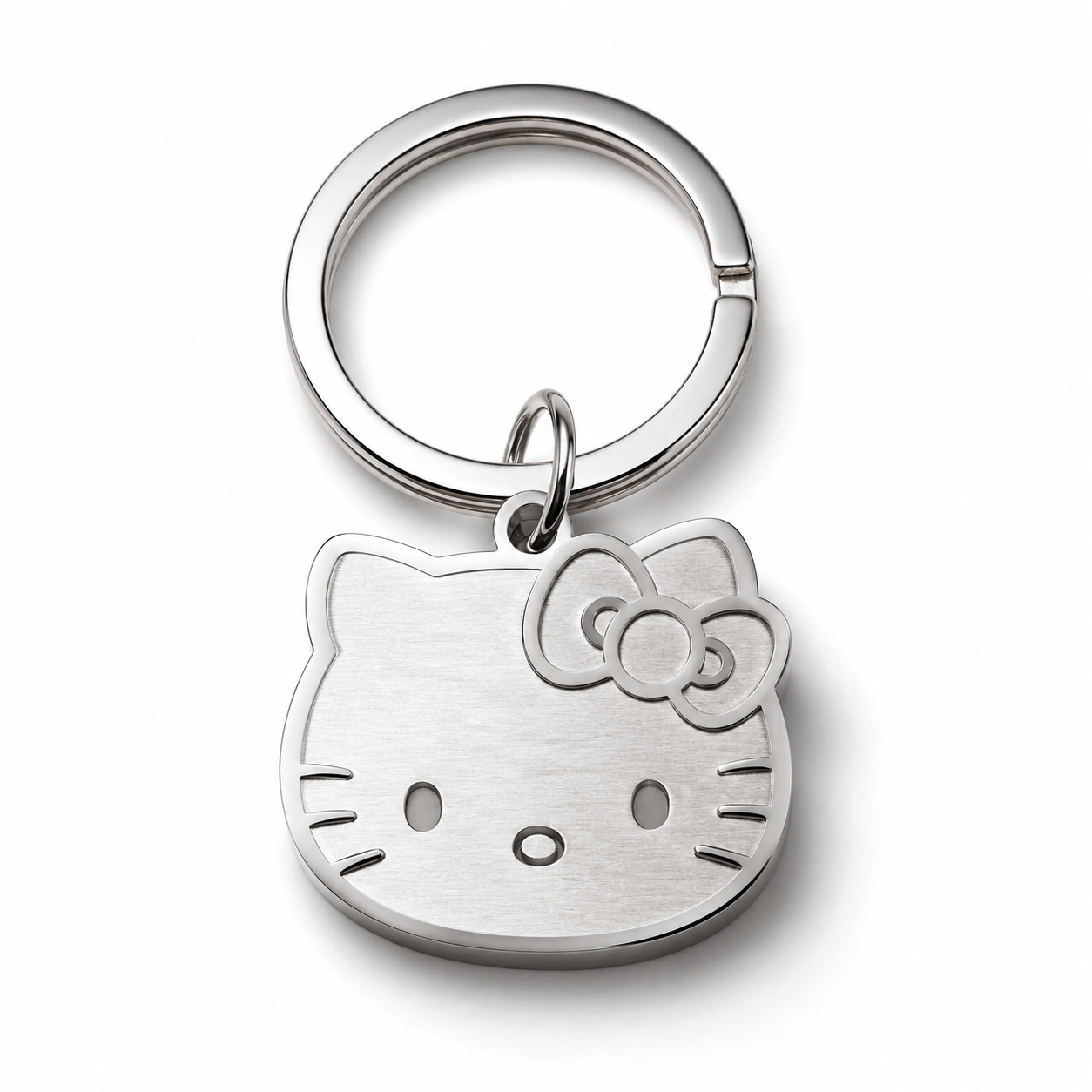 Close-up of a 316L stainless steel charm with PVD gold plating on white background