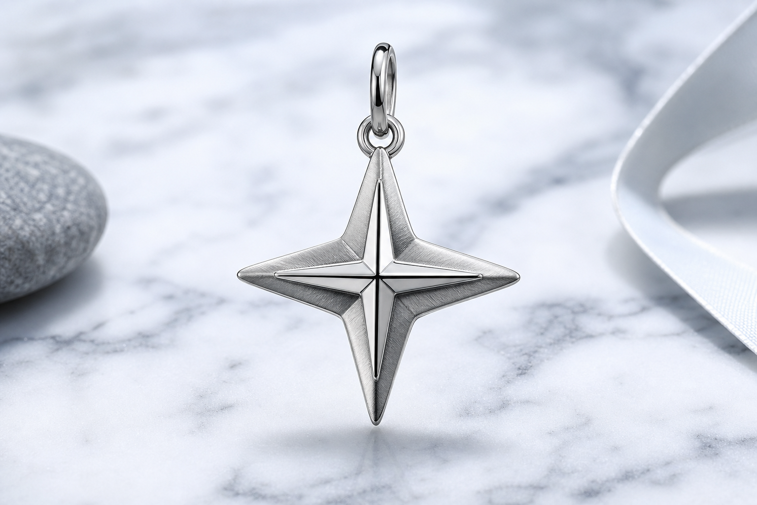 Close-up of a single 316L stainless steel charm on a white background to illustrate finish and detailing