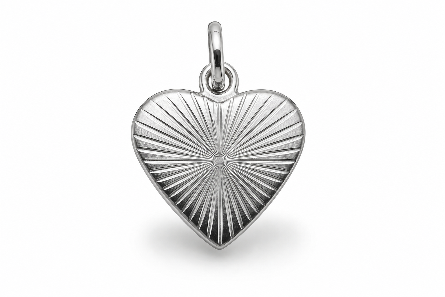 Premium packaging scene showing a single 316L stainless steel charm on a card on a clean boutique display