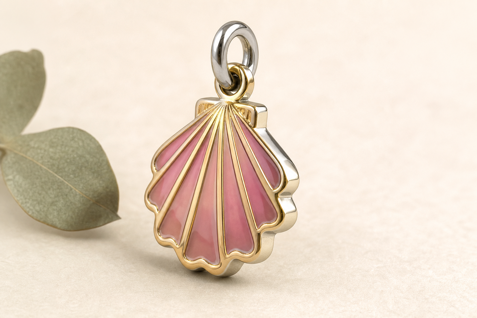 Studio shot of a 316L stainless steel enamel charm on a neutral studio background