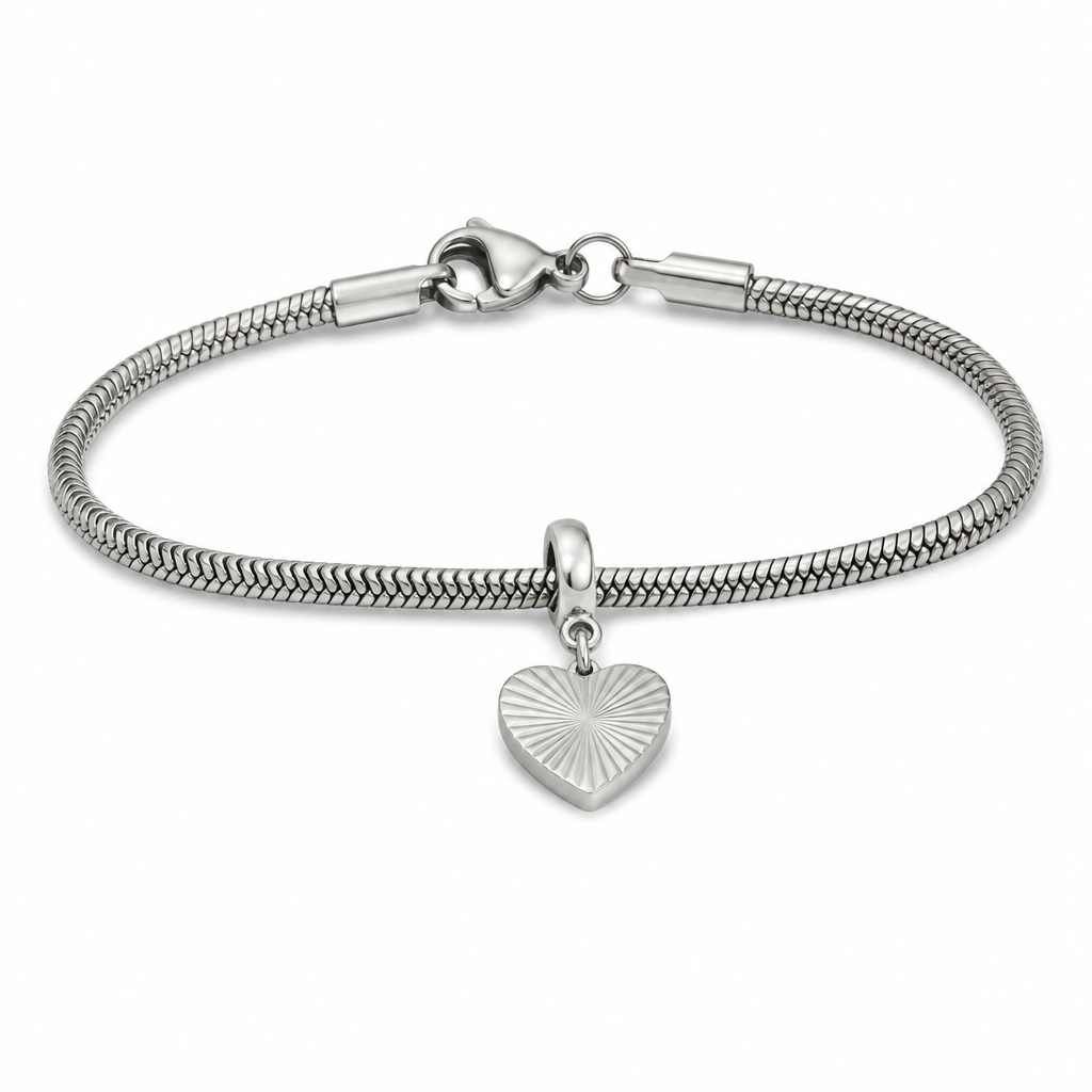 Packaging layout showing inner pouch, cushioning, and outer carton around a single stainless steel charm