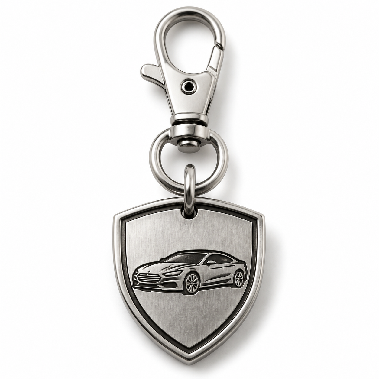 Close-up of a 316L stainless steel car key charm showing bail and plating finish