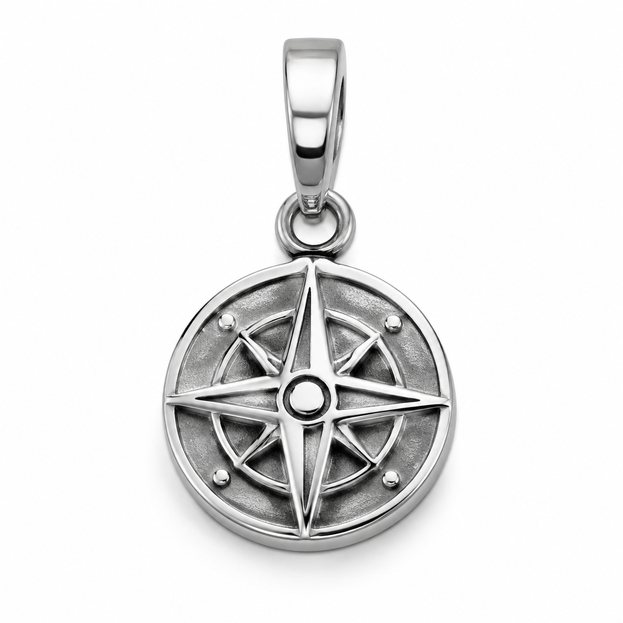 Detail of a tolerance-critical area on a 316L stainless steel charm showing holes, edge radii, and plating thickness