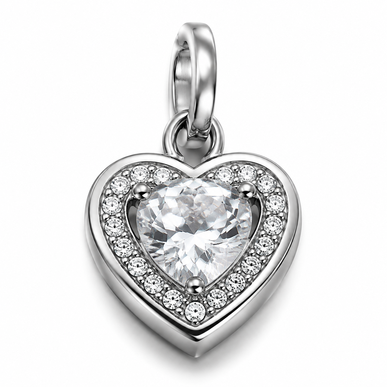 Studio product photography of a 316L stainless steel charm with visible crystal inlay setting and realistic jump ring attachment