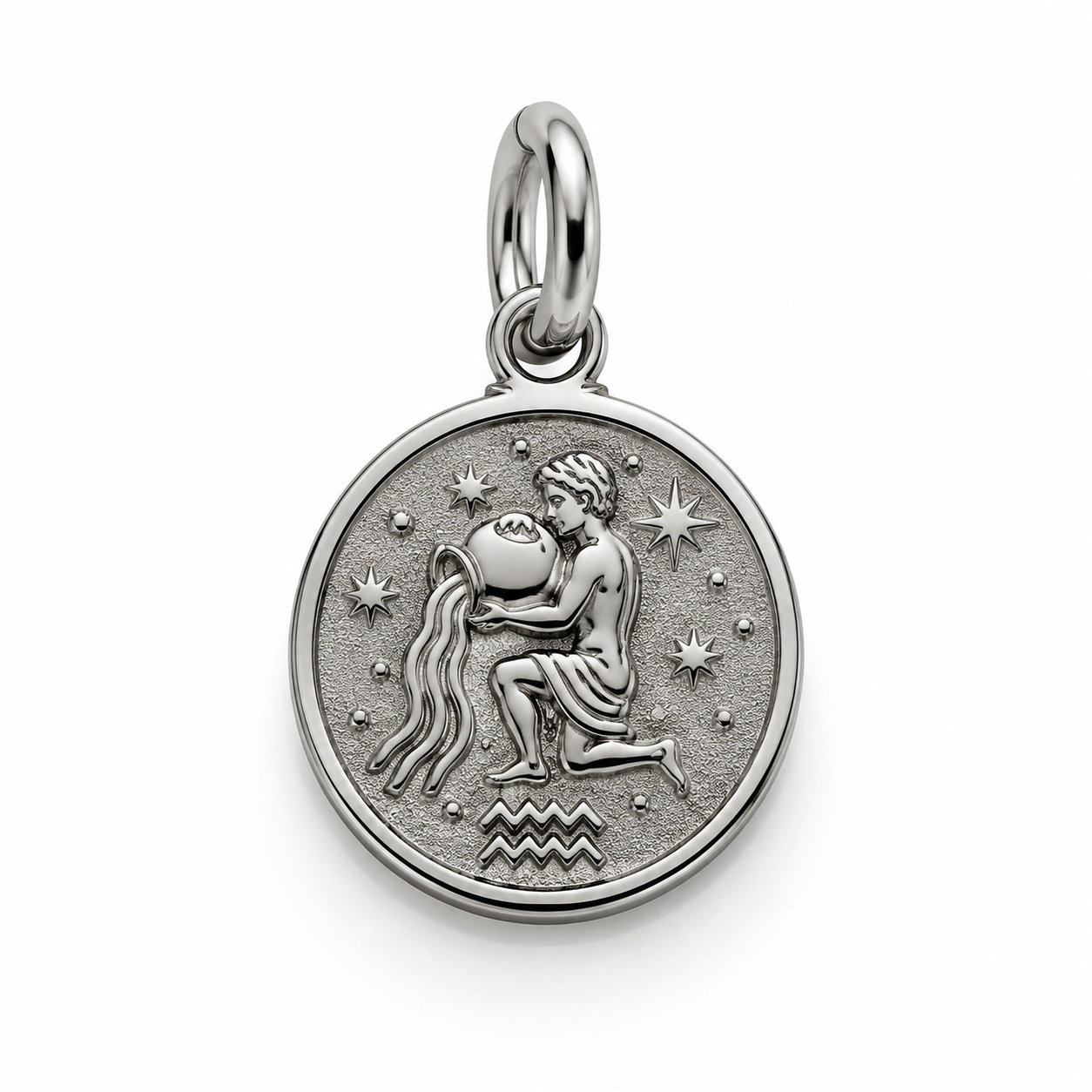 Studio product photography of three 316L stainless steel zodiac charms with visible jump rings on a white background