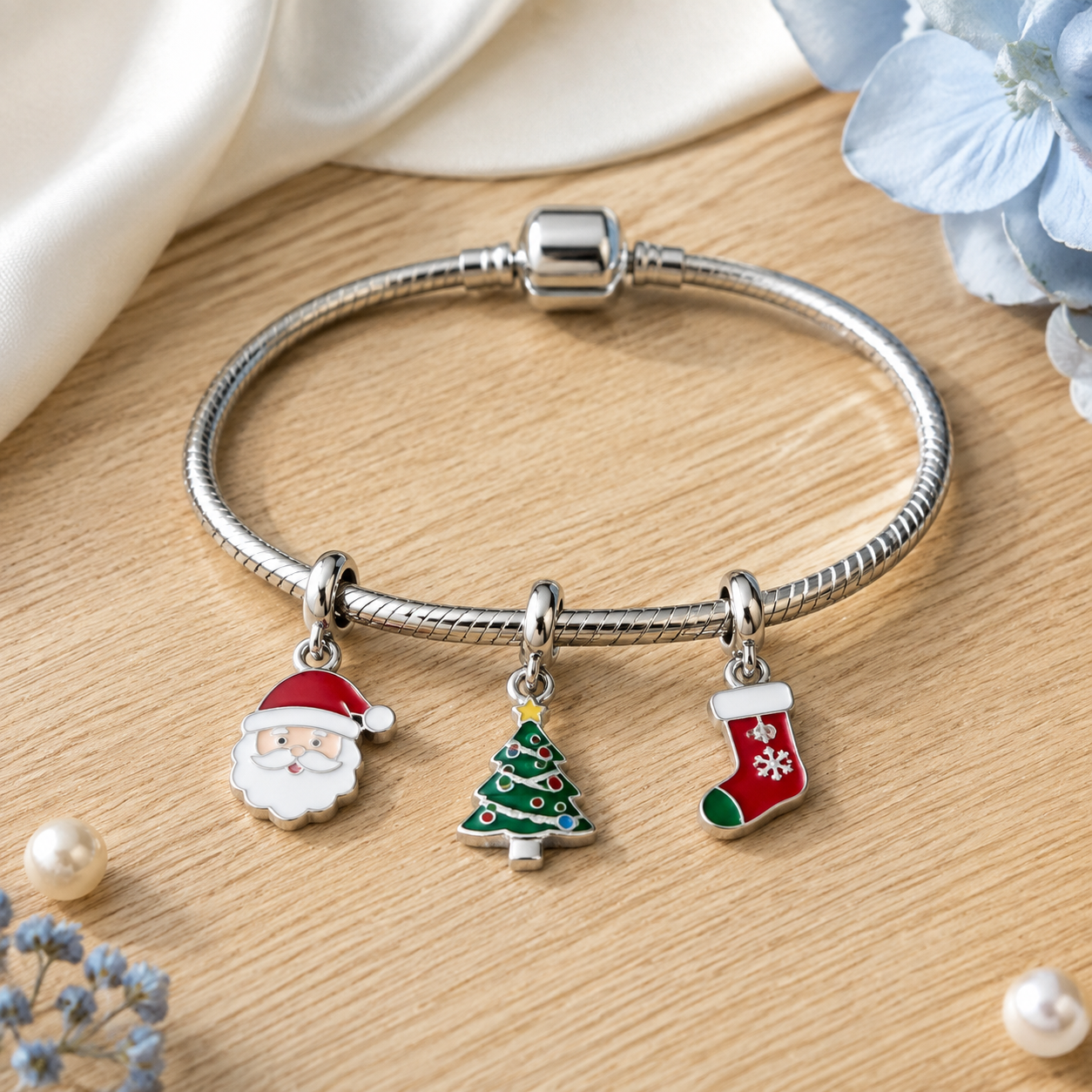 studio product photography of a single 316L stainless steel christmas enamel charm on a pure white background with visible jump ring and realistic shadow