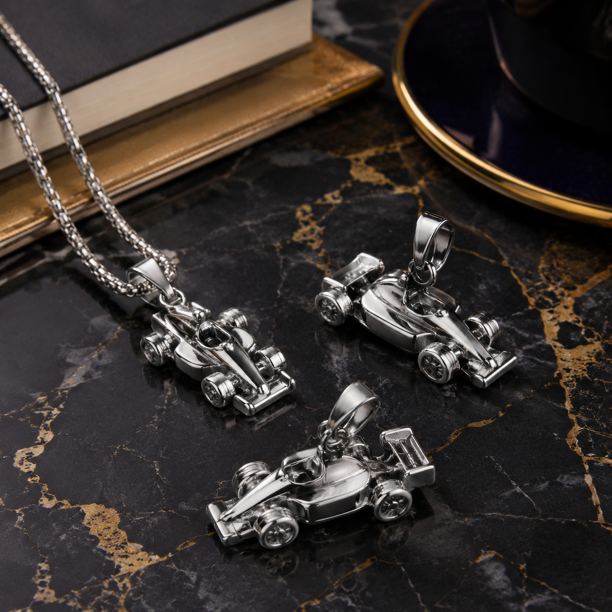 Studio product photography of a single 316L stainless steel race car charm with visible jump ring, front design details, white background, realistic shadow