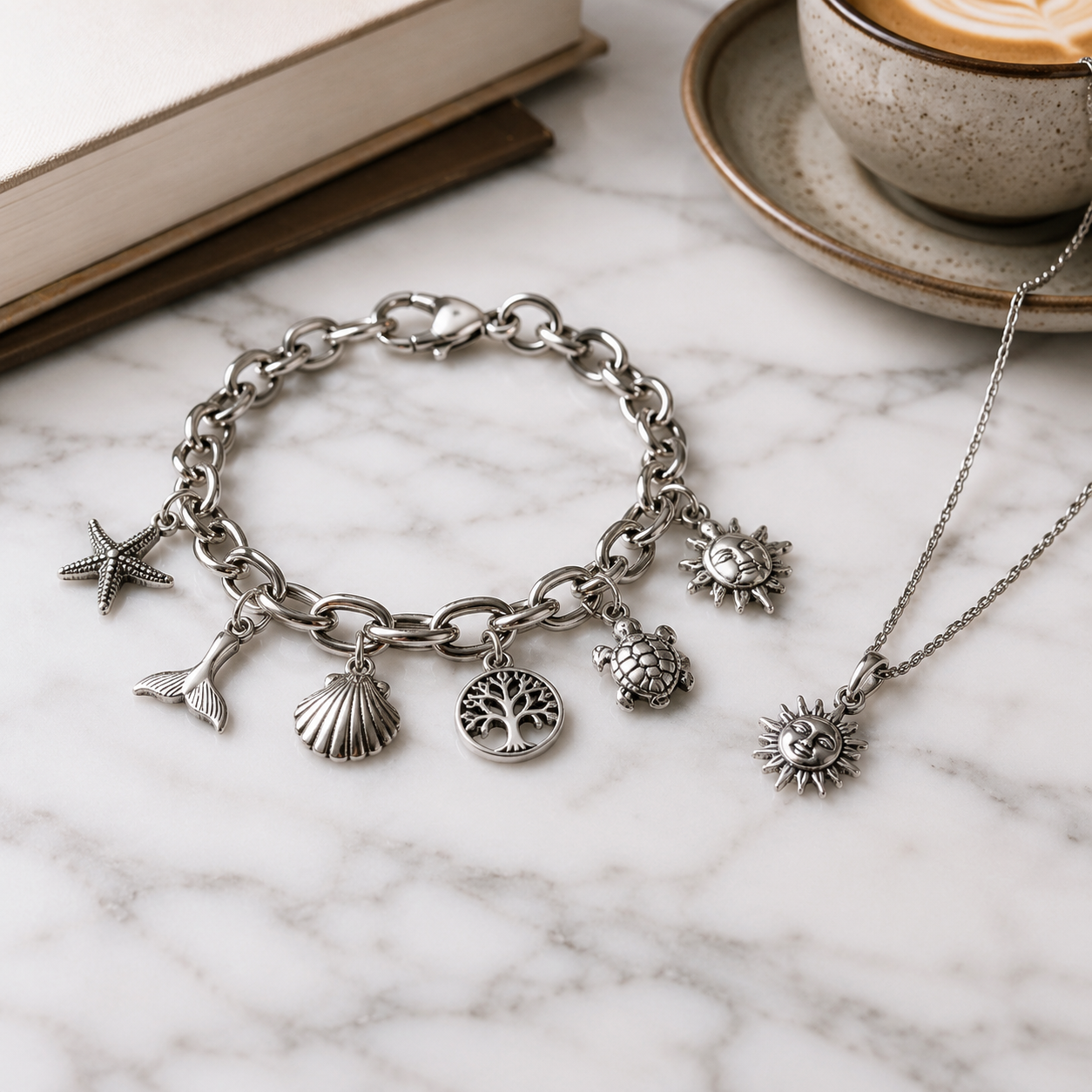 Professional stainless steel charm collection arranged on a boutique display tray