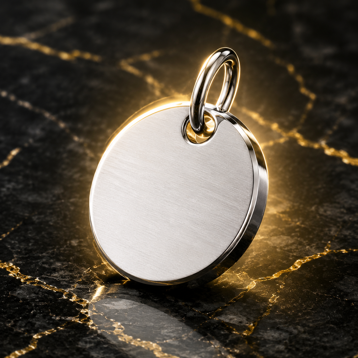 professional studio image of 316L stainless steel blank charm samples with visible jump rings and packaging card